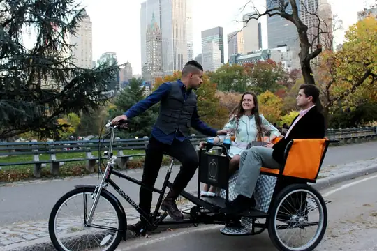 Pedicab tour in Central Park in autumn light